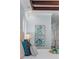 Comfortable bedroom with blue walls, white shutters and decoratively framed artwork at 5909 Oxford Moor Blvd, Windermere, FL 34786