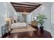 Bright bedroom with a chandelier, hardwood floors, and ample storage at 5909 Oxford Moor Blvd, Windermere, FL 34786