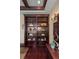Elegant bookshelves with tasteful decor and lighting, creating a sophisticated and inviting space at 5909 Oxford Moor Blvd, Windermere, FL 34786