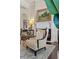 Comfortable chair with patterned fabric positioned near a fireplace, enhanced by elegant decor at 5909 Oxford Moor Blvd, Windermere, FL 34786