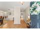 Welcoming foyer with hardwood floors, neutral walls, and a view into the dining area at 627 Darcey Dr, Winter Park, FL 32792