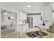 Modern kitchen with stainless steel appliances and granite countertops at 627 Darcey Dr, Winter Park, FL 32792