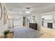 Cozy living room with wood floors, skylights and easy kitchen access at 627 Darcey Dr, Winter Park, FL 32792
