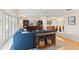 Comfortable living room with open layout, stylish furniture, and hardwood floors at 627 Darcey Dr, Winter Park, FL 32792