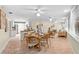 Spacious open floor plan featuring a dining area, kitchen with stainless appliances and a living room at 627 Darcey Dr, Winter Park, FL 32792