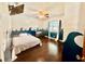 Bedroom featuring blue decor and wood-look flooring at 6653 Se 87Th St, Ocala, FL 34472