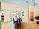 Bright dining room with a neutral color palette and backyard views at 6653 Se 87Th St, Ocala, FL 34472