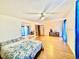 Bright main bedroom boasts ample space, hardwood floors, and stylish furniture at 6653 Se 87Th St, Ocala, FL 34472