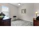 Neutral toned bedroom featuring soft grey carpet, ceiling fan, and natural light at 7288 Winding Lake Cir, Oviedo, FL 32765