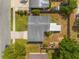 This aerial view shows a well-maintained home with a patio and backyard at 808 Malone Dr, Orlando, FL 32810