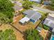 Aerial view of a charming home featuring a screened in patio and a spacious backyard at 808 Malone Dr, Orlando, FL 32810