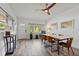 Bright dining room featuring stylish flooring, contemporary furniture, and natural light at 808 Malone Dr, Orlando, FL 32810