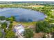 Aerial view of a beautiful lakefront community pool with a dock at 808 Malone Dr, Orlando, FL 32810