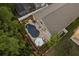 Aerial view of the backyard pool, with patio area perfect for outdoor relaxation and entertaining at 9534 Piccadilly Sky Way, Orlando, FL 32827