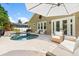 Backyard with a patio, pool, and seating areas, perfect for outdoor entertaining at 9534 Piccadilly Sky Way, Orlando, FL 32827