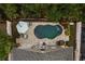 Aerial shot of a private backyard oasis with a beautiful pool, patio, and lush landscaping at 9534 Piccadilly Sky Way, Orlando, FL 32827