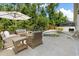 Inviting backyard pool area with comfortable seating, lush landscaping, and a relaxing atmosphere at 9534 Piccadilly Sky Way, Orlando, FL 32827