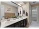 Double vanity bathroom with an abundance of storage space at 1022 Pinehurst Ct, Oviedo, FL 32765