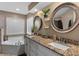 Elegant bathroom with a garden tub and granite countertops, offering relaxation and style at 1022 Pinehurst Ct, Oviedo, FL 32765
