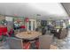 Enclosed patio space with outdoor seating area, bar, and grill - perfect for entertaining at 1022 Pinehurst Ct, Oviedo, FL 32765