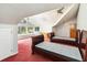 Spacious bedroom with large windows, skylight, and two twin beds at 1093 Hidden Harbor Ln, Kissimmee, FL 34746