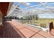Spacious deck offering scenic views of the pool and landscape beyond at 1093 Hidden Harbor Ln, Kissimmee, FL 34746