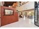 Foyer with elevator, high ceilings, and an open floorplan leading to the dining area at 1093 Hidden Harbor Ln, Kissimmee, FL 34746