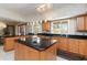 Well-designed kitchen featuring ample counter space, an island, and stainless steel appliances at 1093 Hidden Harbor Ln, Kissimmee, FL 34746