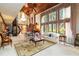 Living room with high ceilings, large windows, and elegant decor at 1093 Hidden Harbor Ln, Kissimmee, FL 34746
