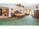 Large main bedroom offering a seating area, ceiling fan and plenty of space at 1093 Hidden Harbor Ln, Kissimmee, FL 34746