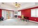 Bright main bedroom featuring a fireplace, ceiling fan, and private balcony access at 1093 Hidden Harbor Ln, Kissimmee, FL 34746