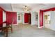 Spacious main bedroom with carpet, decorative pillars and multiple entry ways at 1093 Hidden Harbor Ln, Kissimmee, FL 34746