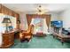 Cozy office space with a large desk, comfortable chair, and natural light at 1093 Hidden Harbor Ln, Kissimmee, FL 34746