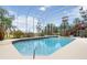 Indoor pool with screened enclosure, natural light and view of outdoors at 1093 Hidden Harbor Ln, Kissimmee, FL 34746