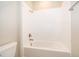 The bathroom showcases a tiled shower and tub combo, complete with modern fixtures at 11054 Cyrilla Woods Dr, Orlando, FL 32832