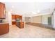 This spacious kitchen features an island and stainless steel appliances in an open floor plan at 11054 Cyrilla Woods Dr, Orlando, FL 32832