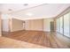 The living space features hardwood floors, recessed lighting, and sliding glass doors at 11054 Cyrilla Woods Dr, Orlando, FL 32832