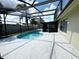 Backyard features a large pool and an enclosed patio at 12112 Shallot St, Orlando, FL 32837
