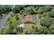 Aerial view showcasing the property's pool, landscaping, and spacious yard at 12202 Rambling Oak Blvd, Orlando, FL 32832