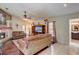 Relaxing living room boasts a fireplace, large entertainment center, and access to a bathroom at 12202 Rambling Oak Blvd, Orlando, FL 32832