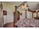 Comfortable main bedroom with detailed trim, vaulted ceilings, and wood flooring at 12202 Rambling Oak Blvd, Orlando, FL 32832