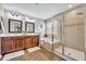 Bathroom features a double vanity, soaking tub and glass enclosed shower at 13505 Phoenix Dr, Orlando, FL 32828