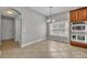 Bright breakfast nook with tile floors and lots of natural light, adjacent to the kitchen at 13505 Phoenix Dr, Orlando, FL 32828