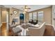 Comfortable living room features a fireplace and an abundance of natural light at 13505 Phoenix Dr, Orlando, FL 32828