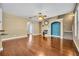Spacious living room with hardwood floors and a cozy fireplace at 13505 Phoenix Dr, Orlando, FL 32828