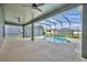 A screened in pool with patio space at 13505 Phoenix Dr, Orlando, FL 32828