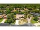 Aerial view of property showcasing mature landscaping and neighborhood at 140 Margate Mews, Longwood, FL 32779