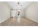 Bright bedroom with a ceiling fan and access to the bathroom at 140 Margate Mews, Longwood, FL 32779