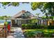 Community building exterior with well-manicured lawn at 140 Margate Mews, Longwood, FL 32779