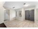 Bright entryway with tile floors, double front door, and a closet at 140 Margate Mews, Longwood, FL 32779